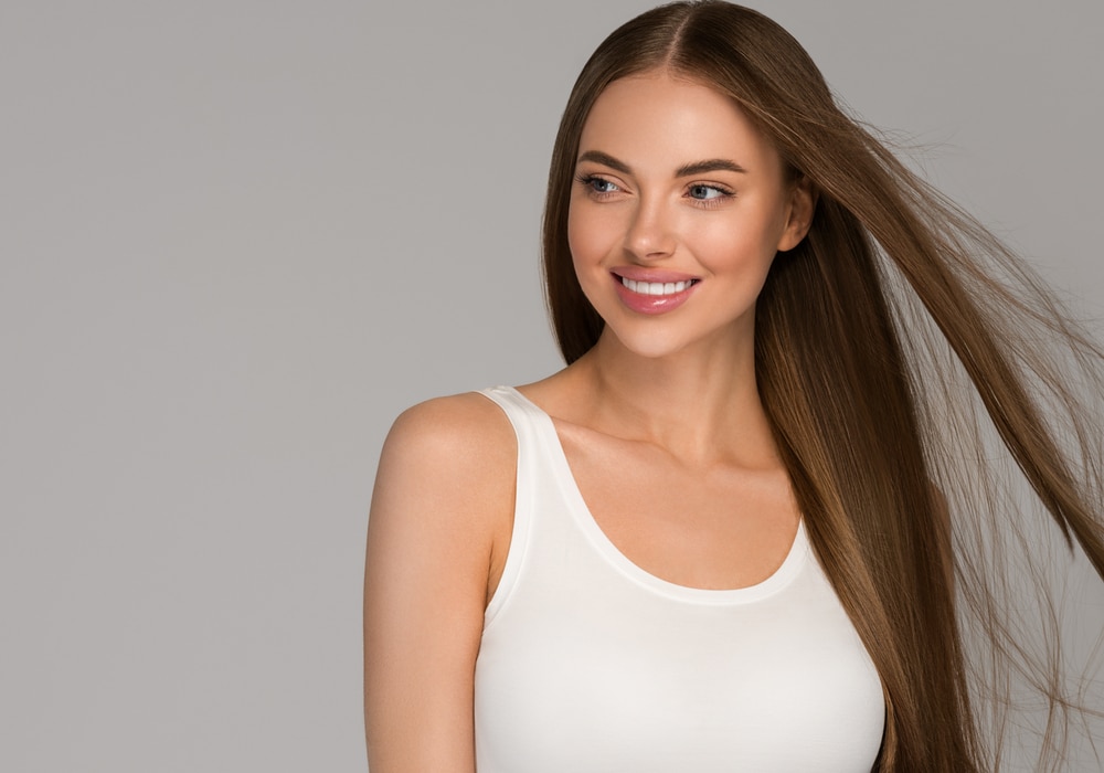 Beautiful,Woman,Teeth,Smile,With,Healthy,Long,Hair,Beauty,Skin Brazilian Blowout in Bonita Springs, FL